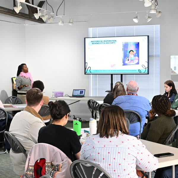 Charnaie Gordon presents during the conference.