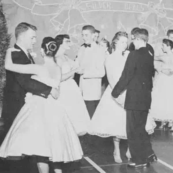 A black-and-white photo showing students dancing from an old UT Southern yearbook.