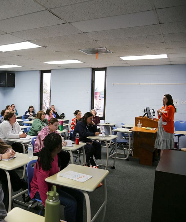 Attendees listen to a presenter during the Lynn McKee Erwin Conference.